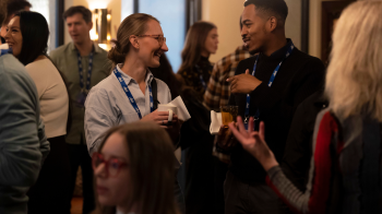 Two people chatting at an event